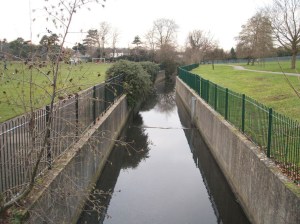River Ravensbourne now in concrete channel in Queens Mead.